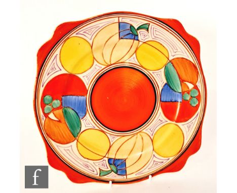 Clarice Cliff - Melon - A large Leda shape plate circa 1930, hand painted with a band of stylised abstract fruit with orange 