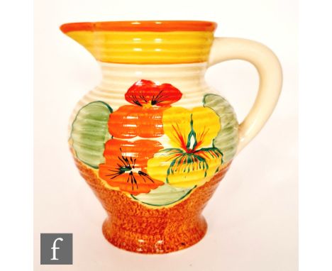 Clarice Cliff - Nasturtium - A shape 564 George jug circa 1933, hand painted with stylised flowers and foliage over a stipple