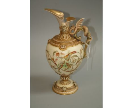 A late 19th century Royal Worcester blush ivory and gilt ewer of baluster form with cut and rolled spout, dragon entwined han