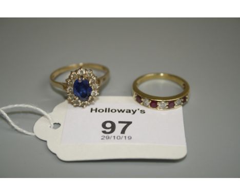 A sapphire cluster ring, the oval cut sapphire within a border of white stones, to 14ct gold mount, together with a ruby and 