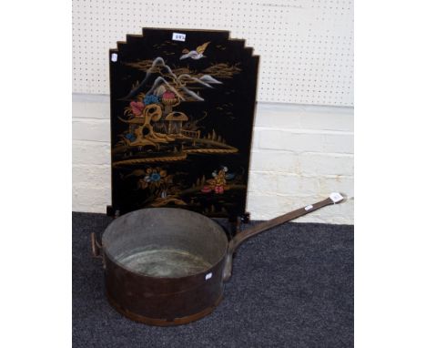 A 1920's black lacquer painted and gilt chinoiserie decorated firescreen, together with a large Victorian copper saucepan wit