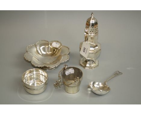 A 20th silver octagonal section sugar caster the pierced cover with urn finial, Sheffield 1959, together with a petal edged b