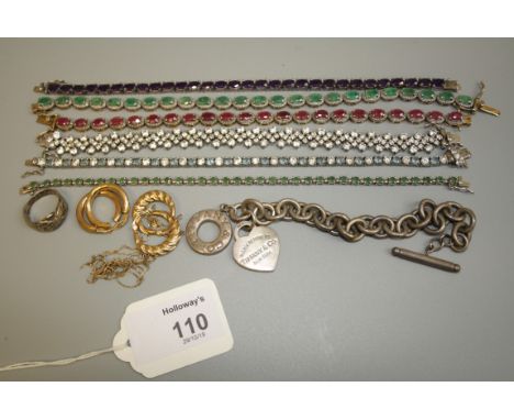 Two pairs of metal hoop earrings, a 9ct gold chain, a ruby set bracelet and six other bracelets, including one marked Tiffany