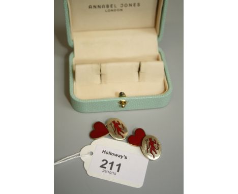 Deakin and Francis for Annabel Jones. A pair of silver gilt and enamel cufflinks, one plaque with red enamel heart, the oppos