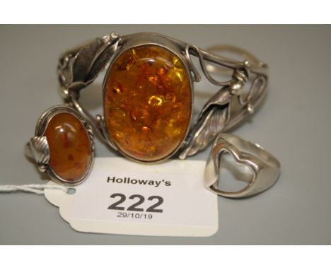 A silver vintage style bracelet with amber stone with matching ring and a silver love heart ring