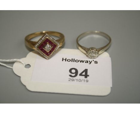 A ruby and diamond cluster ring, the oblique square cluster set with bands of eight cut diamonds and calibre set rubies, to a