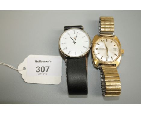 A gentleman's stainless steel Longines quartz wristwatch, circular white enamel dial, Roman numerals, slim case with extended