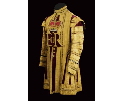 dating: Second part of the 20th Century provenance: England, Made of burgundy velvet with black velvet collar and sleeves, al