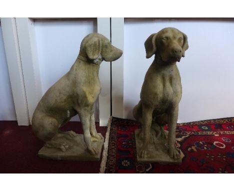 A pair of reconstituted stone hunting dogs, seated on rectangular bases, H.75cm, (2) 