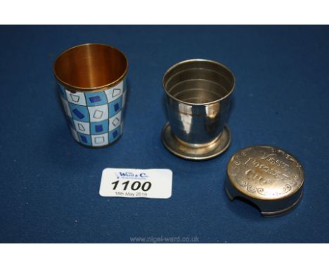 A mid 20th c. enamel on metal toddy cup and an early 20th c vest expanding toddy cup.