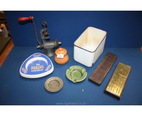 A quantity of miscellanea to include two cribbage boards, three ashtrays, small brown pot and old metal mincer.