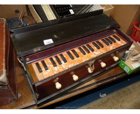 An Indian table-top Harmonium, The Vara Flute