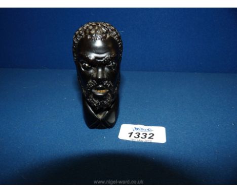 A carved ebony Head, being the top of walking stick.