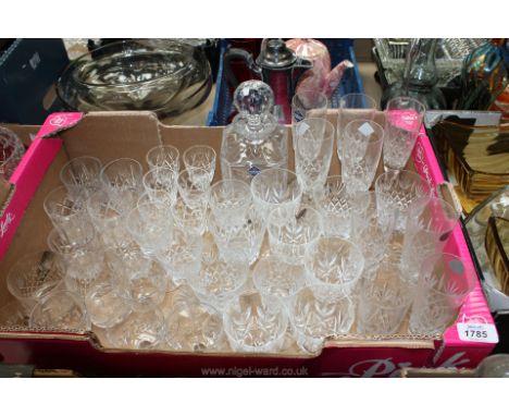 A quantity of cut glass wine, champagne and whisky Glasses including Edinburgh, Thomas Webb, etc. plus decanter.