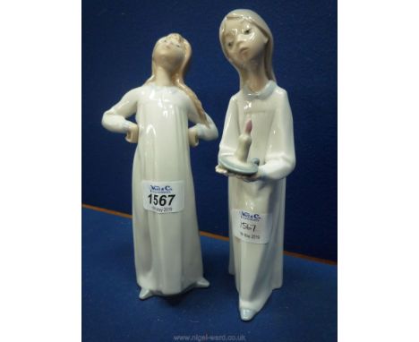A Lladro figure of a girl in a nightdress ready for bed and a girl carrying her chamber stick ready for bed.