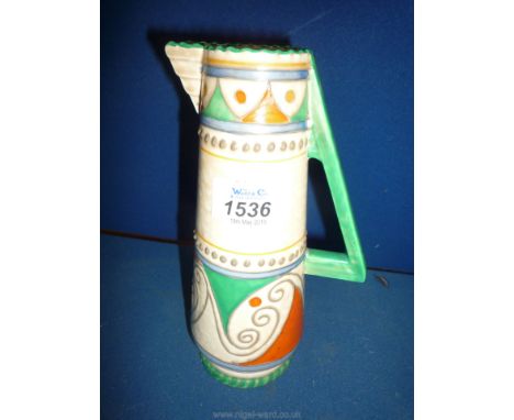 A 1930's Art Deco Crown Ducal jug decorated in orange, green, beige and 8" high.