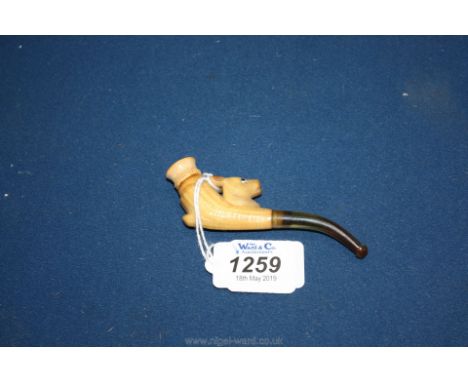 A Meerschaum type Smoker's Pipe depicting a plant stem/trunk and an Antelope's head.