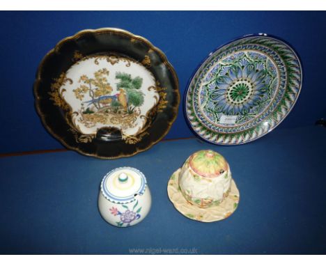A large ceramic plate with hand painted exotic birds highlighted in gilt, 10" wide, a hand painted plate in blue and green wi
