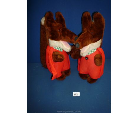 A pair of vintage Basil Brush.