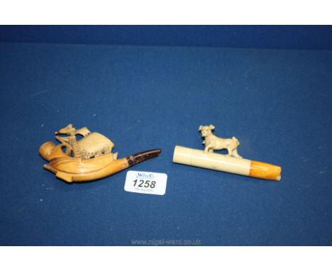 A Meerschaum type Smoker's pipe depicting an oriental sailing vessel, the amber mouthpiece having some damage and another dep