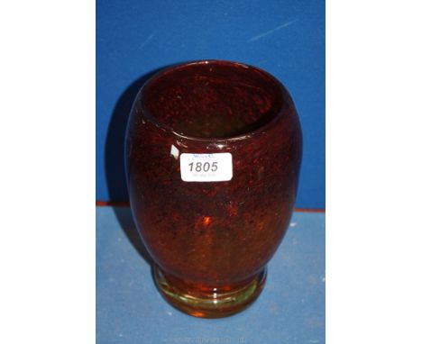 A vintage Monart glass Vase with heavy moulded base in amber merging with brown speckled crackle effect design, 8'' high.