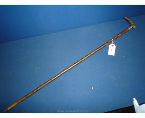 A good quality Victorian walking Stick with carved antler handle of twisted design and ornate silver ferrule, hallmark not cl