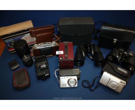 A quantity of Cameras and equipment to include a box Brownie, Agfa Isolette, a Nikon coolpix, cinematograph &amp; film strip 