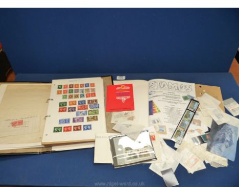 A black file of British Stamps and the Commonwealth including Geo. V penny red (1922) and an Usborne stamp Book with quantity