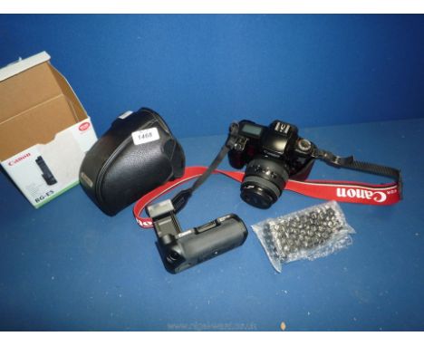 A Canon EO5 1000F Camera and a Canon battery grip.