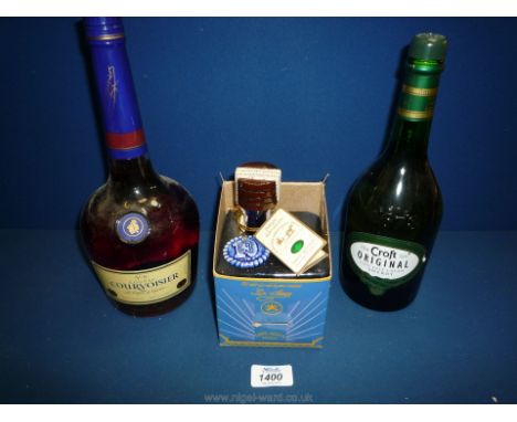 A bottle of Courvoisier  Brandy, Croft Original Pale Cream Sherry and Tequila.