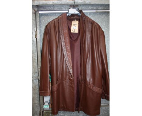A ladies vintage 3/4 brown leather Coat, made in England, small size and in good condition.