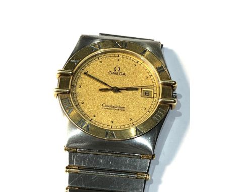 Vintage gents omega gold and steel constellation chronograph quartz wristwatch in need of repair strap lug has broken non wor