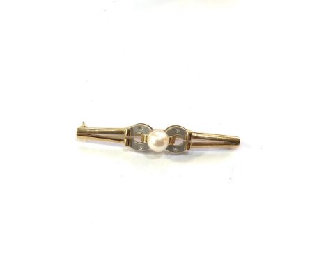 Millenium 9ct white and yellow gold diamond and pearl brooch measures approx 52mm by 9mm weight 4.7g 