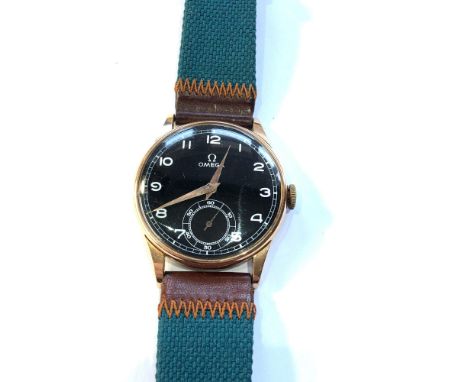 1940s Vintage gold Gents Omega presentation wristwatch manual wind black dial watch is ticking but no warranty given measures