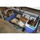 Four boxes containing various pictures and prints