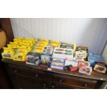 A collection of boxed die cast model vehicles