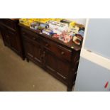 An oak Ercol sideboard