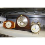 An oak cased two hole mantel clock and two other c