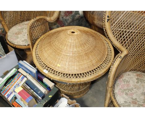 A wicker table and wicker light shade