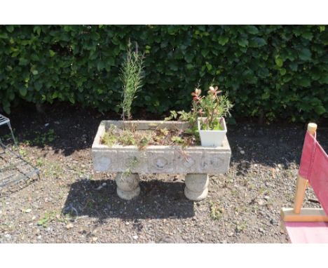 A concrete garden plant trough 