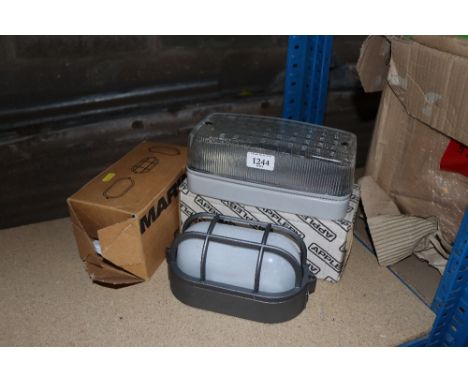 Two exterior wall light fittings with original boxes