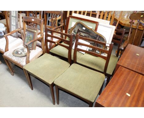 A set of four ladder back chairs