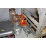 Three Kilner jars and a mincer