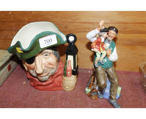 A Royal Doulton character jug 'Smuggler' and a Royal Doulton figure 'The Puppet Maker' 