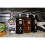 Four bottles of non alcoholic spirits