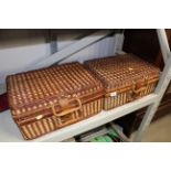 Two wicker picnic baskets and contents
