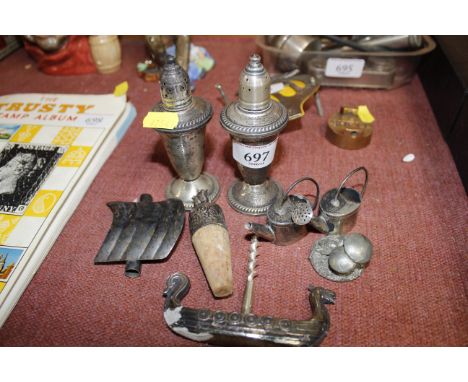 A Sterling silver salt and pepper, Sterling silver salt and pepper in the form of watering cans, a corkscrew in the form of a