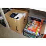 Two boxes containing board games, puzzles and line