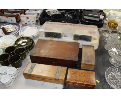 An Intercom telephone and a collection of wooden trinket boxes