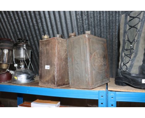 Two metal two gallon fuel cans named to 'Red Line' and 'Esso', both with caps